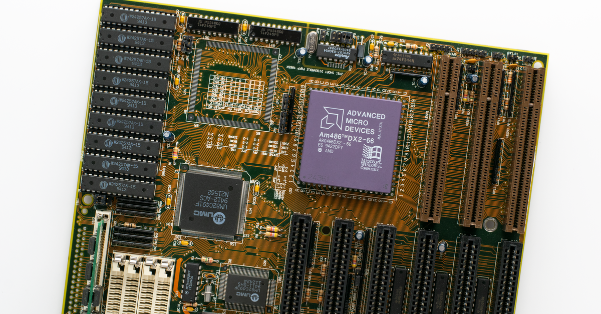 AMD Locks 2.5GW Core Scientific AI Deal and Unveils MI400 GPUs, EPYC 9006 CPUs Detailed view of a vintage computer motherboard featuring an AMD processor and electronic components.
