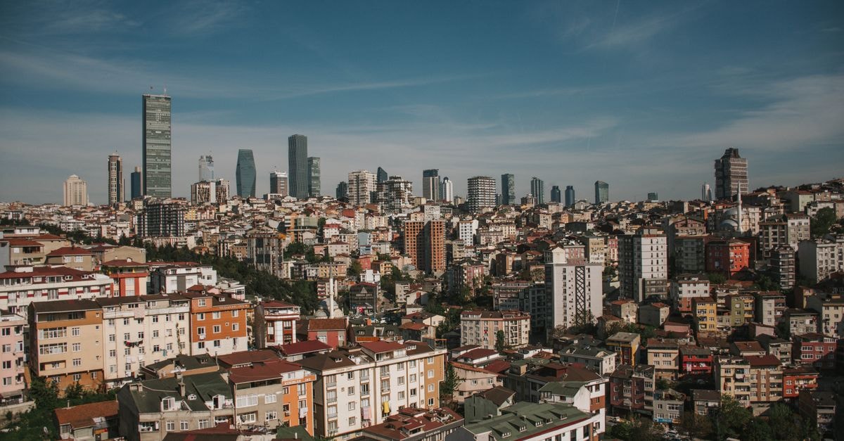 Selahaddin Eyyubi Mesleki ve Teknik Anadolu Lisesi ve Uygulama Oteli, Sultangazi — A Practice-Hotel Classroom Stay Breathtaking aerial view of Istanbul's urban skyline under a clear blue sky.