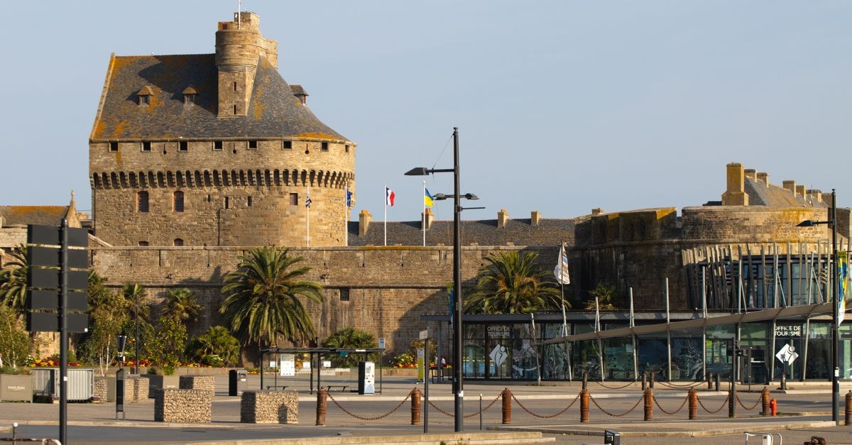 Saint-Denis Travel Guide: Planning Tips, Costs and Things to Do Explore the medieval charm of Saint-Malo's iconic fortifications bathed in sunlight.