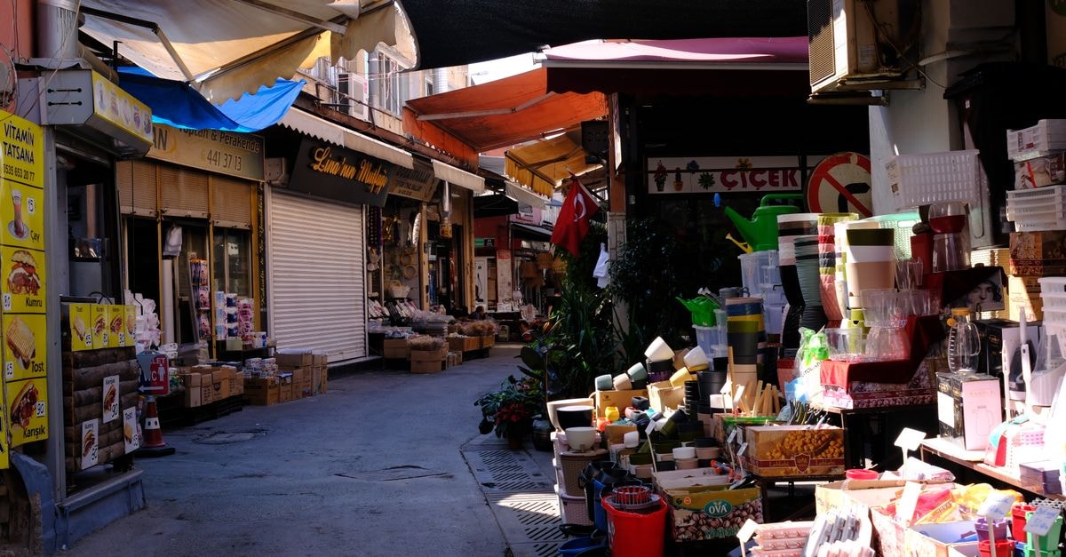 Explore the bustling street market scene in Bornova, İzmir, with inviting shops and local goods.