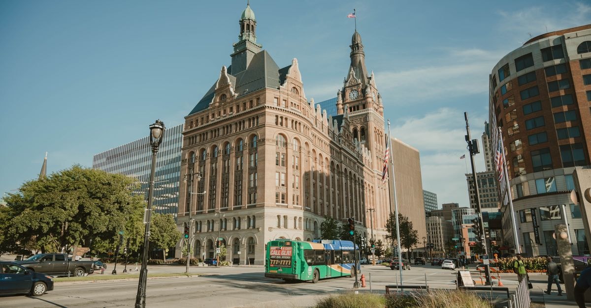 Milwaukee City Hall's iconic architecture shines under a clear blue sky in Wisconsin.
