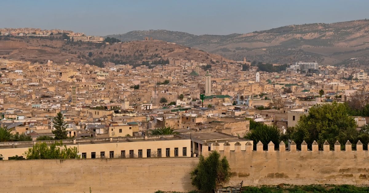 Explore the historic cityscape of Fes, Morocco, showcasing its unique architecture and sprawling urban landscape.