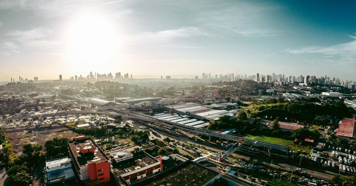 Hosteria del Parque in San José de Mayo: 40 Hectares of Parkland on Ruta 3 Expansive aerial cityscape of San Miguelito in Panama, featuring urban landscapes and sunlight.