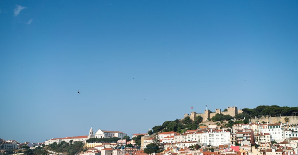 Andaz Lisbon, Portugal — Heritage Charm on Praça do Comércio Amazing view of Lisbon City slope under clear blue sky on beautiful day in summertime