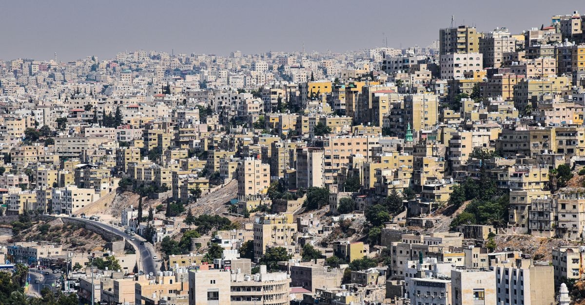 Aerial view of Amman, Jordan showcasing dense urban architecture and vibrant city life.