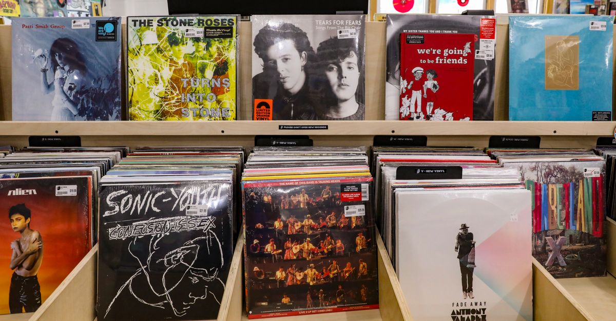Country music news: Musgraves cancels tour stops, Twain releases new album, Wallen lands another chart-topper Explore a vibrant collection of new vinyl records in a Tulsa record store's wooden shelves.