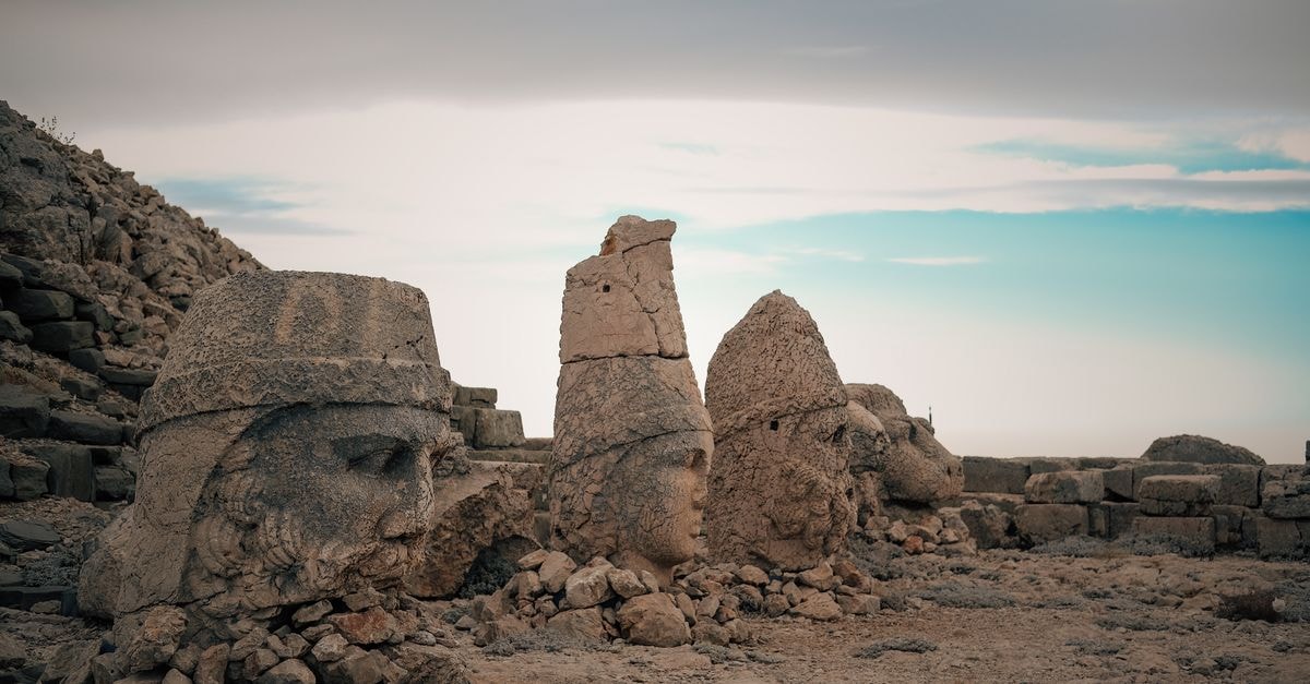Park Dedeman Adıyaman in Adıyaman: Modern Stay Near Mount Nemrut Majestic ancient stone heads at Mount Nemrut in Adıyaman, Turkey, showcasing historical grandeur.