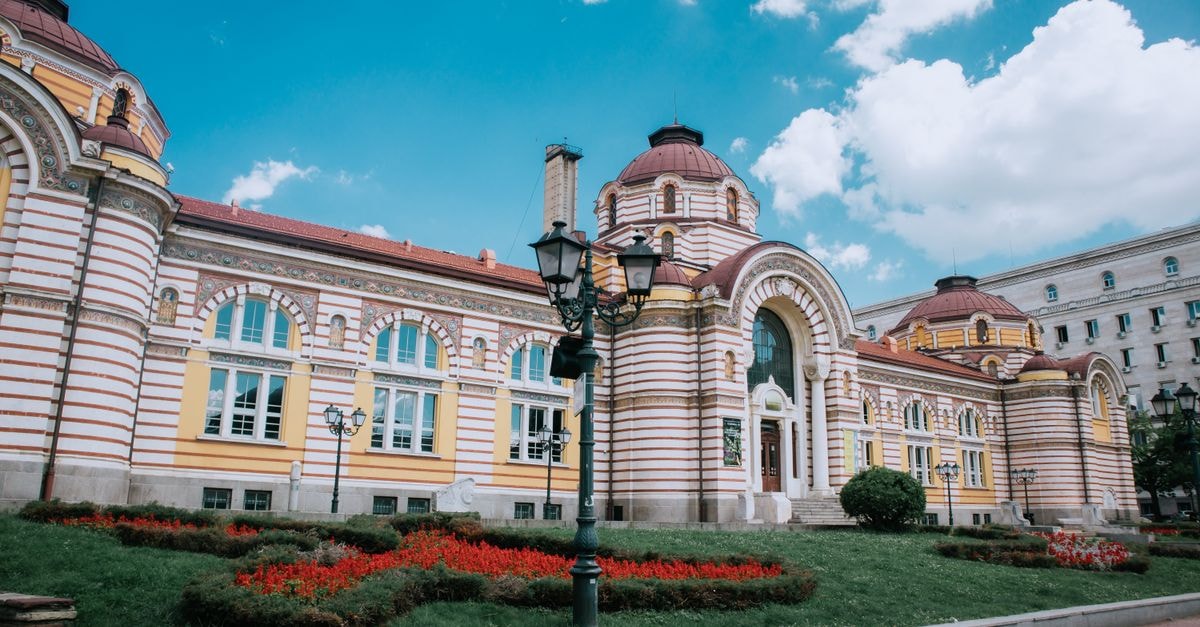 Suceava Travel Guide: A Quiet Gateway to Moldavian History Central Mineral Baths in Sofia with stunning neo-Byzantine architecture under a clear blue sky.