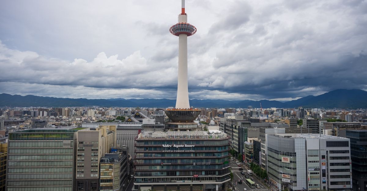 Rinn Kamiebisu in Kyoto: A Calm Black-and-White Stay in Shimogyo Explore the iconic Kyoto Tower surrounded by scenic urban landscapes in the heart of Kyoto, Japan.