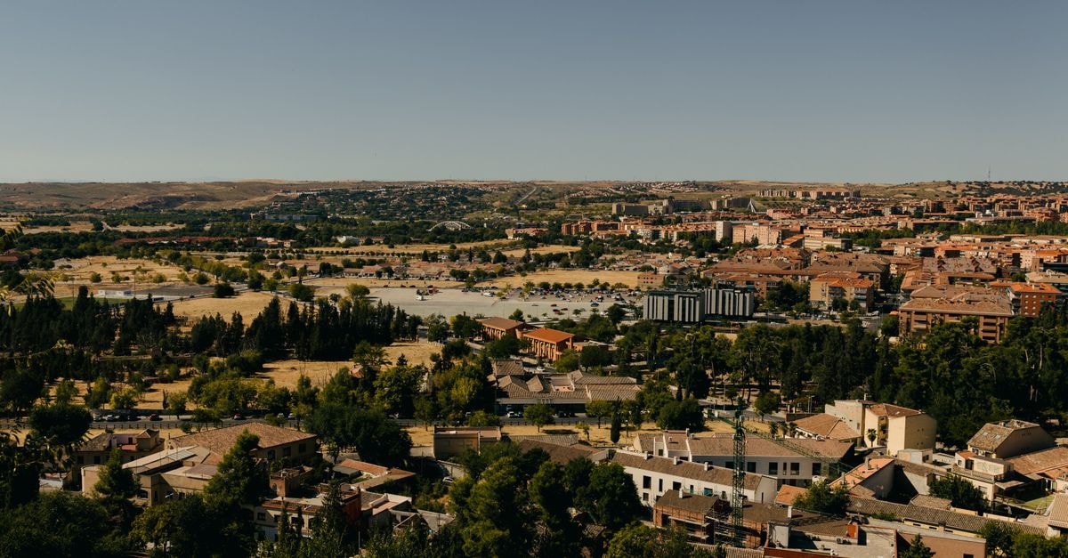 Silice Garden in Zamora: A Solar-Powered Jungle Retreat with Private Waterfalls A panoramic aerial view of Toledo, Spain showcasing its historic architecture and landscapes.