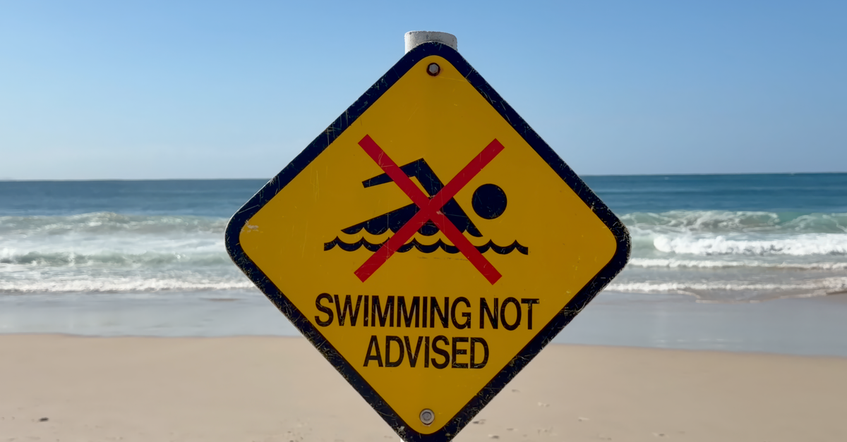 Rinehart's Commonwealth Games bonuses welcomed by Kyle Chalmers, as Australian swimmers warned against public thanks Warning sign on Byron Bay beach advising against swimming due to safety concerns.