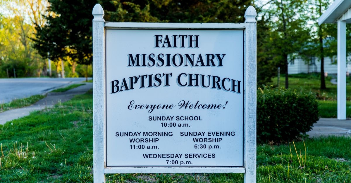 AC Hotel Kansas City Downtown: A 1911 Rialto Building Reborn Sign for Faith Missionary Baptist Church with service times in Kansas City, MO.