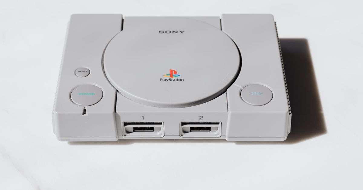 PS5 Server Outage Hits Players While New 2026 Game and PS1 Classic Arrive A classic Sony PlayStation console captured on a white background exuding retro gaming nostalgia.