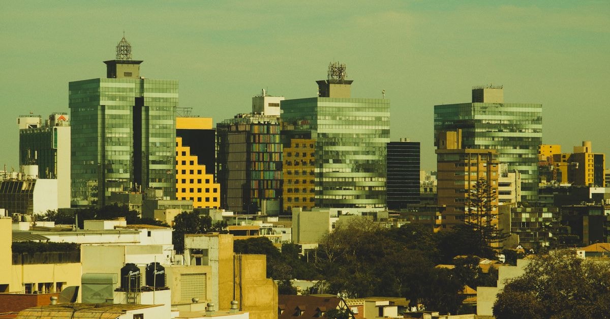 Civasa Hotel in Quilmes: A Practical Stop on Andrés Baranda 439 Aerial view of a modern cityscape with tall buildings and urban skyline.