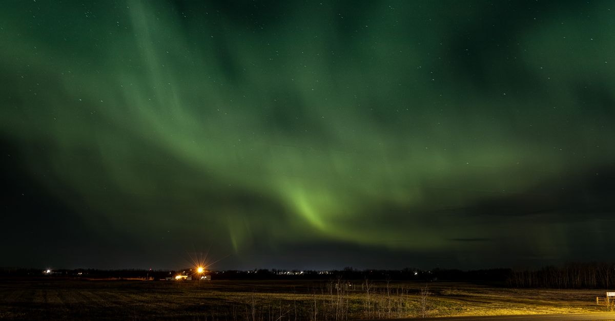Captivating view of the Northern Lights illuminating the night sky over Lloydminster, Canada.