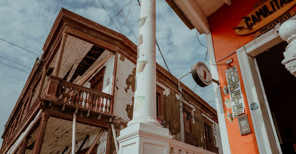 Vintage buildings in Pacasmayo, Peru, showcasing local architecture and culture.