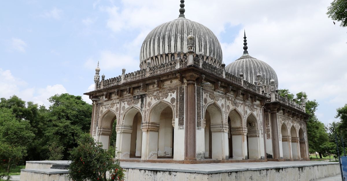 Karimnagar Travel Guide: Planning Tips, Costs and Things to Do Beautifully ornate Indo-Islamic architecture of a historic tomb on a clear day.