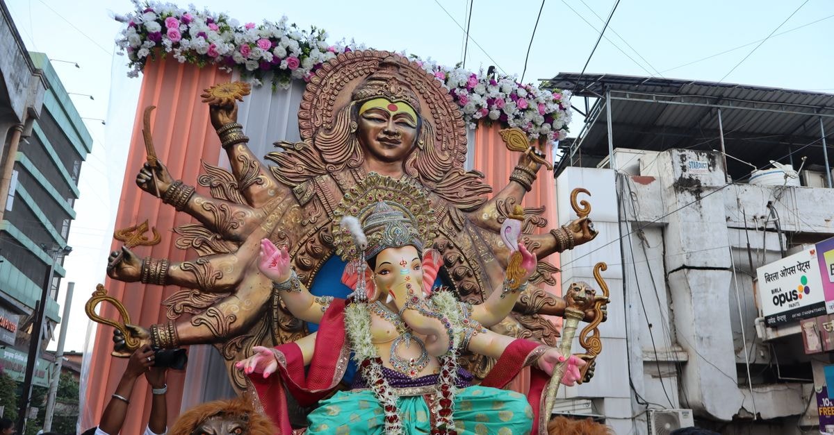 Ganpati International in Chandrapur: A Practical Stay on Kasturba Road Colorful procession of Ganesh Visarjan in Chandrapur, Maharashtra, India during the vibrant festival.