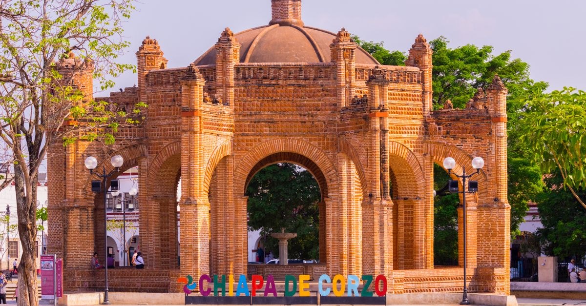 Chapecó Travel Guide: Planning Tips, Costs and Things to Do Historic La Pila Fountain in Chiapa de Corzo, Mexico, showcasing intricate brick architecture under a bright sky.