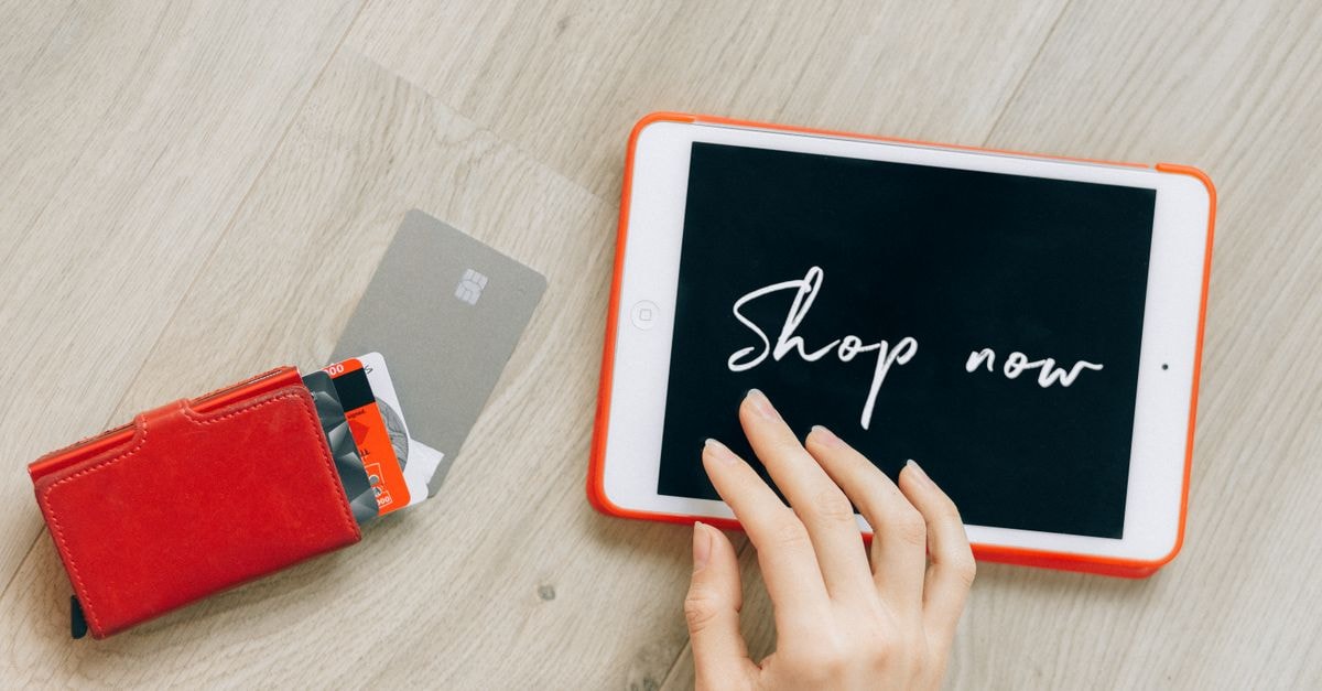 Phillip Securities Upgrades Snowflake to Strong-Buy Close-up of a digital shopping theme with a tablet and credit cards, highlighting a modern retail experience.