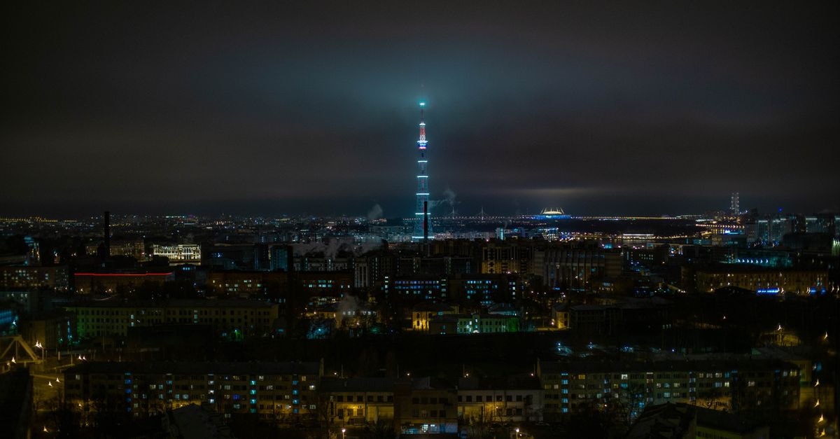 Days Inn in St. Petersburg: A 34th Street North Stop A stunning aerial view of Saint Petersburg at night, highlighting the radiantly illuminated cityscape and iconic television tower.