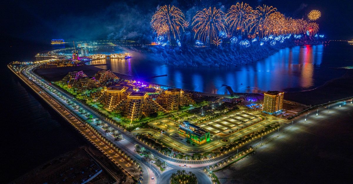Hilton Garden Inn Ras Al Khaimah in Ras Al Khaimah: Harbour-View Base Near the Waterfront Breathtaking aerial view of fireworks over Ras al Khaimah coastline at night.