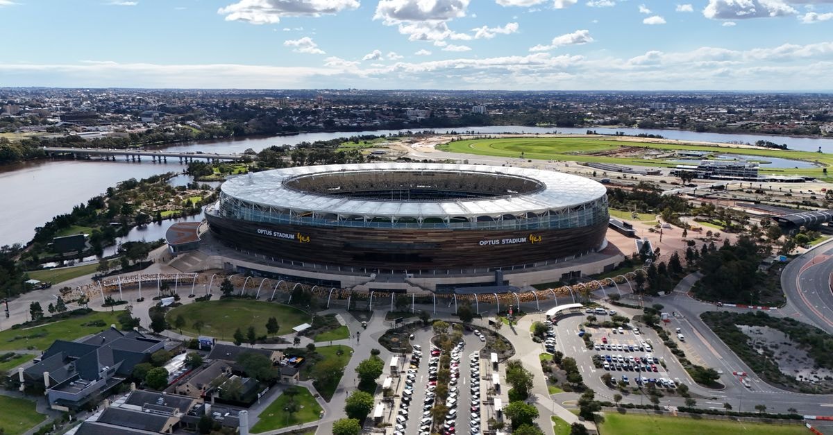 Stunning aerial view of Optus Stadium in Perth, showcasing the modern architecture and surrounding landscape.