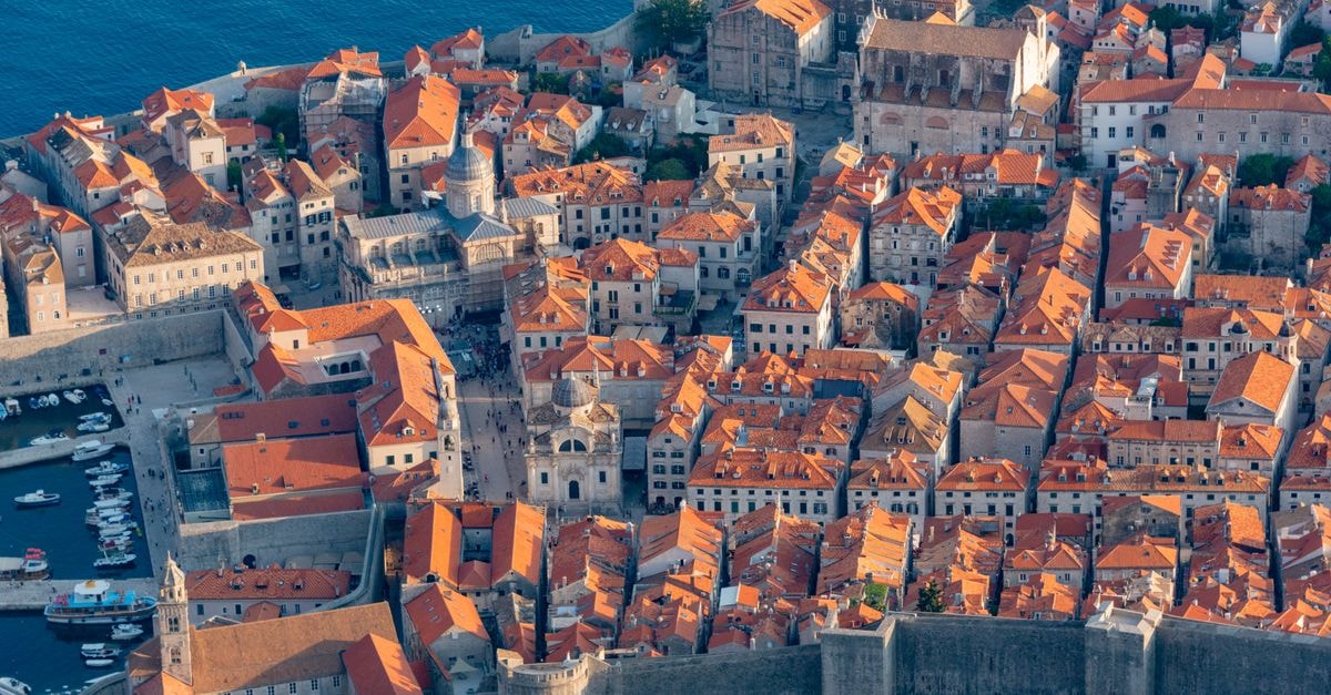 My Way Hostel Dubrovnik, Croatia — A Modern Hostel Near the Old Town Stunning aerial capture of Dubrovnik's Old Town and majestic Adriatic Sea coastline.