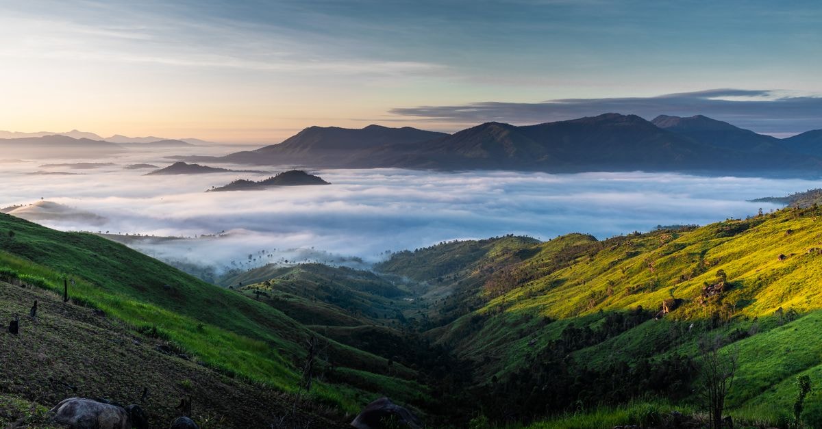 Aileu Travel Guide: A Quiet Highland Pocket of Timor-Leste Breathtaking view of misty mountains and lush valleys in Kon Tum, Vietnam at sunrise.
