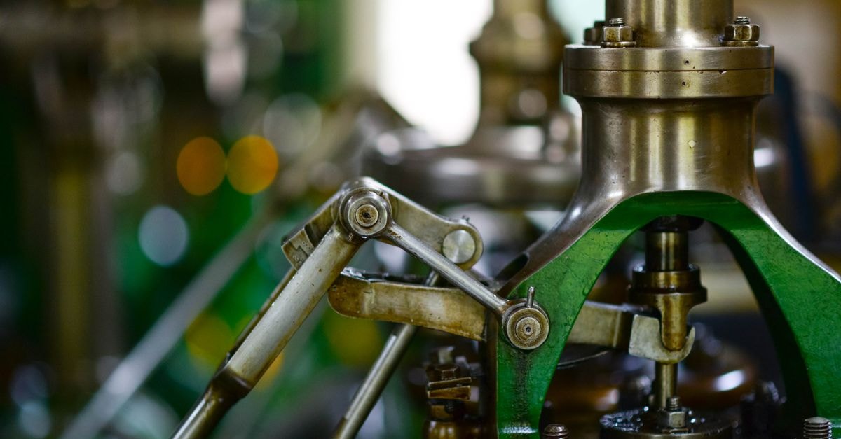 Enovix Corp: A Pre-Revenue Bet on a Battery Architecture Detailed view of mechanical components in an industrial setting, showcasing metal gears and levers.