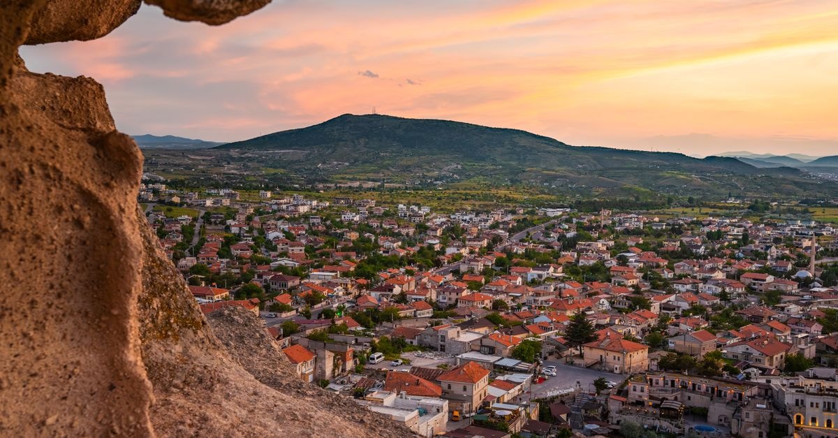 Hotel Fieri in Fier: Modern Comfort in Albania's Vibrant City Beautiful sunset view over Uçhisar, Nevşehir, showcasing the vibrant cityscape and natural landscape.
