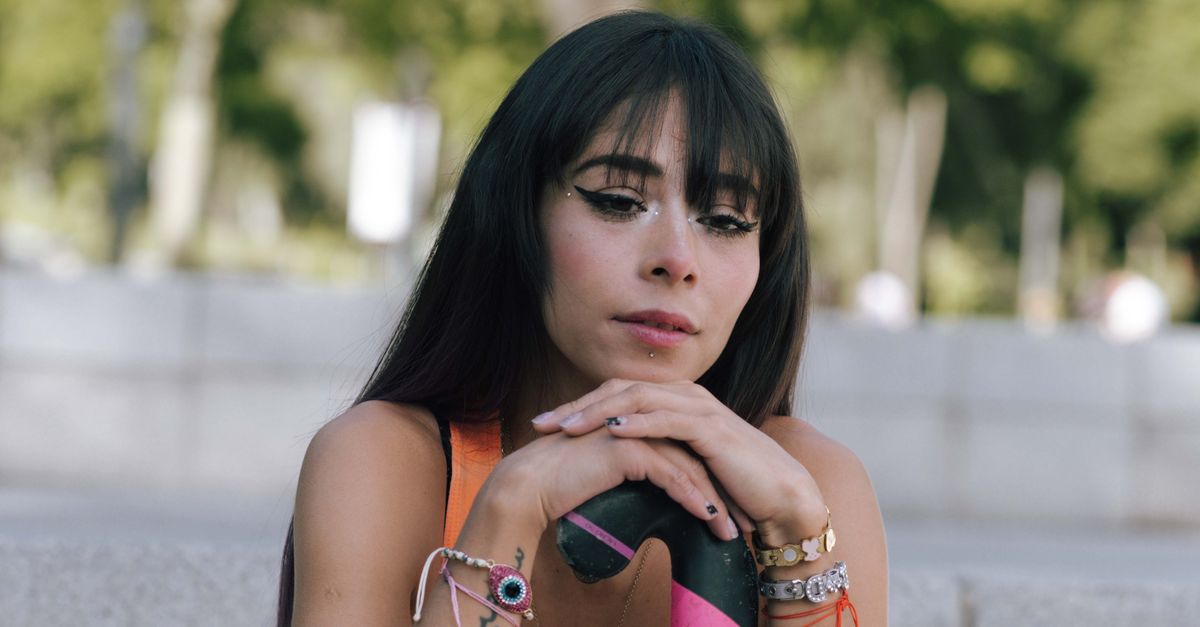 Weekend streaming roundup: Charli XCX, Tyla, The Strokes and Hulu's 'Nirvanna' lead July 24 releases Young woman posing with skateboard, showcasing chic fashion and modern style in a city park.