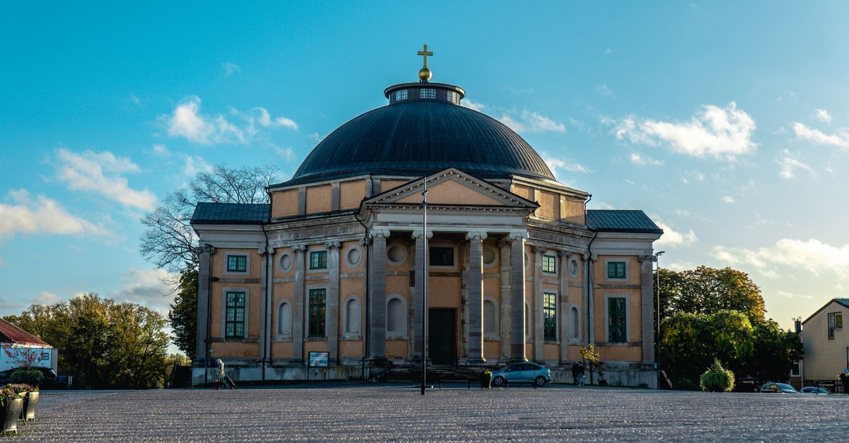 Marupe Travel Guide: Planning Tips, Costs and Things to Do A historic church with a dome in the sunlight, located in Karlskrona, Sweden.