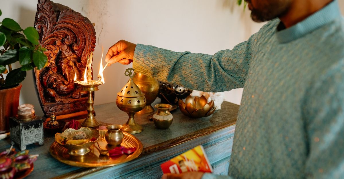 Spider-Man: Brand New Day Debuts in India as Ramayana Trailer Launches Ahead of Diwali 2026 A man in traditional attire lighting a Diwali lamp, showcasing Indian culture and traditions.