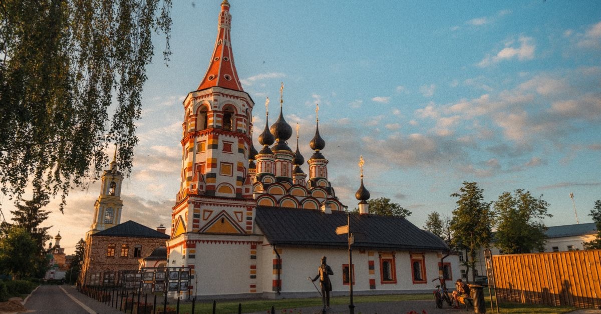 Nizhny Tagil Travel Guide: Planning Tips, Costs and Things to Do A beautiful Orthodox church in Suzdal, Russia captured at sunset, showcasing vibrant architecture.