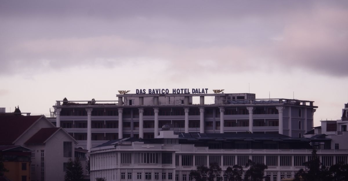 Banyan House in Da Lat: A Farmhouse-Turned Bungalow Retreat Dramatic view of Das Bavico Hotel in Dalat, Vietnam during twilight.