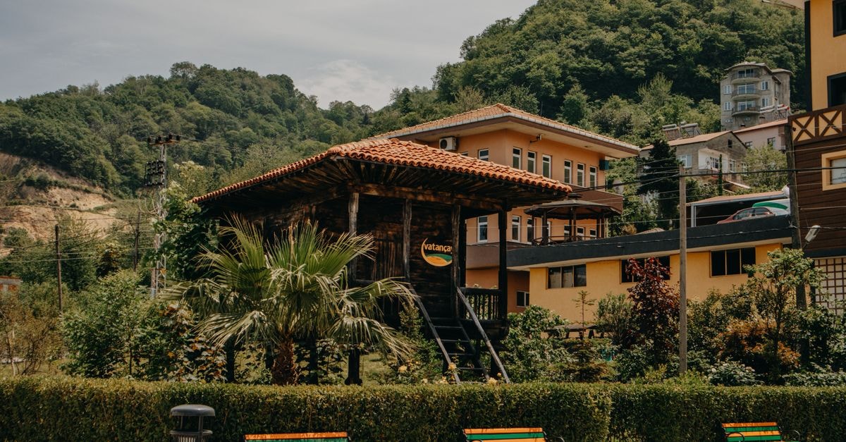A Quiet Pocket of Central Hunan: A Travel Guide to Loudi Scenic view of traditional architecture in Trabzon, Turkey surrounded by lush green hills.