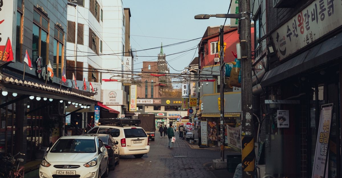 New M Hotel, Suwon — A Compact Stay in Ingye-dong Vibrant street in Suwon-si, South Korea, showcasing local architecture and lifestyle.