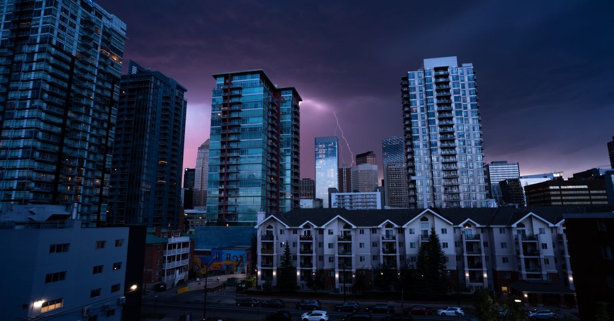 The Westin Calgary: Downtown Retreat in the Heart of Calgary A striking cityscape of Calgary at night with lightning illuminating the skyline.