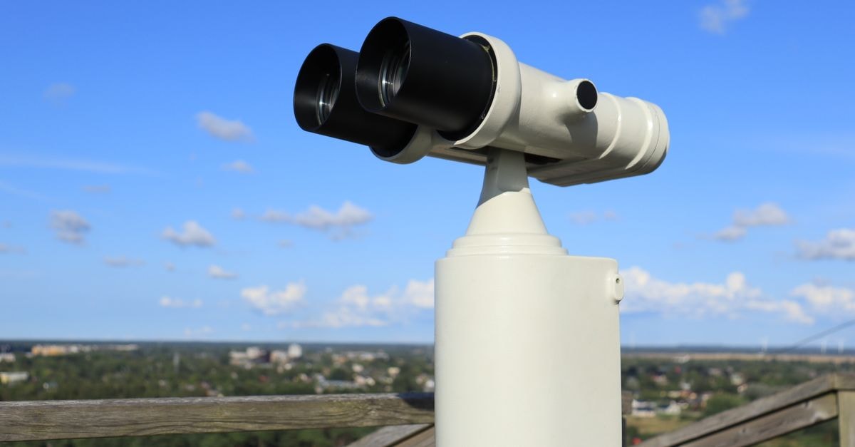 Domus Beati in Marijampolė: Riverside Pilgrimage Guesthouse A public telescope offering a stunning daytime view of the city skyline.