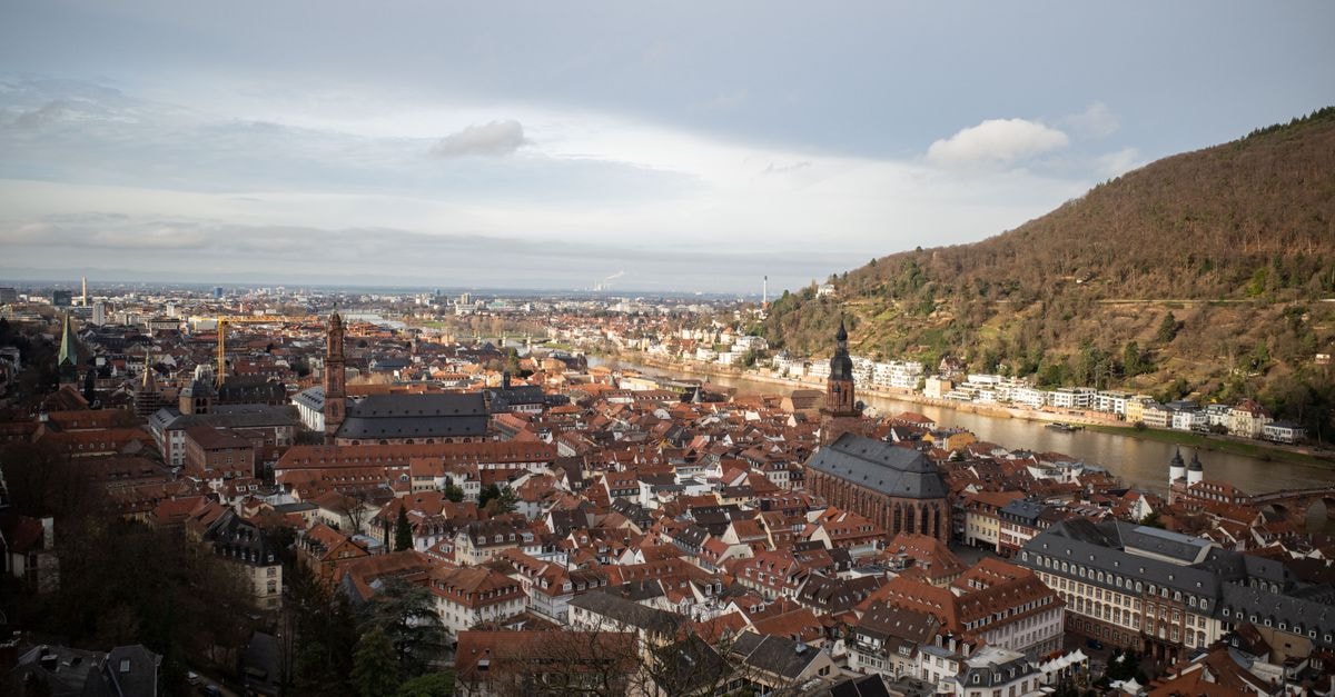 Heidelberger Hof in Heidelberg: Rooms Named After City Landmarks Stunning aerial view of Heidelberg, Germany showcasing classic architecture and the Neckar River.
