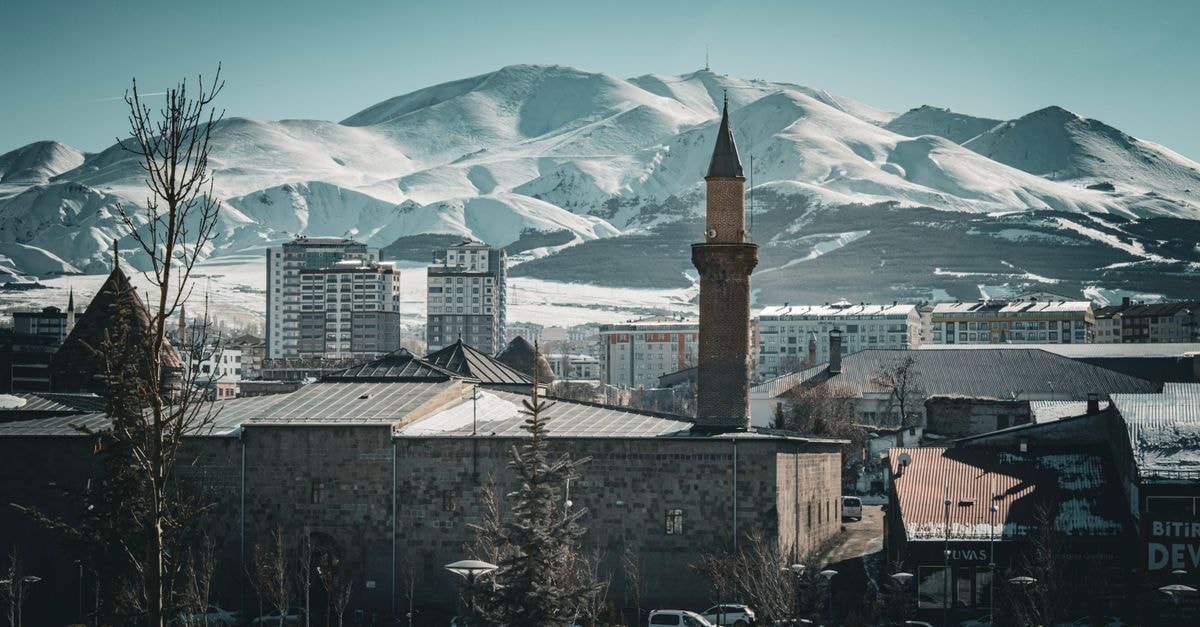 A stunning winter view of Erzurum city with snow-capped mountains in Türkiye.