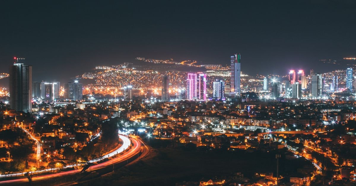 Hotel Euro in Maracaibo: Avenida Las Delicias Address Since 2000 Stunning aerial shot of İzmir's vibrant cityscape, showcasing modern architecture and illuminated skyscrapers.