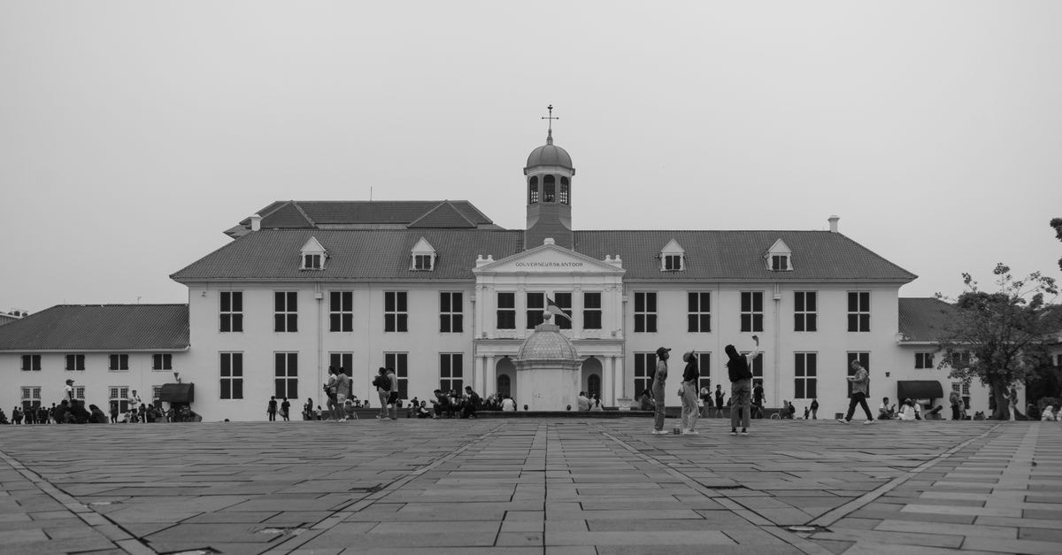 One World Hotel in Kota Damansara: Connected to 1 Utama via MRT Passage Black and white view of Jakarta History Museum with people in the town square.