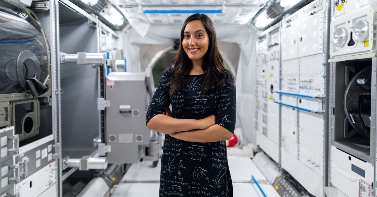 Soyuz MS-28 Crew's 241-Day ISS Mission Advances Cancer Research and Space-Based Medical Manufacturing A smiling female scientist in a futuristic space station, symbolizing innovation and exploration.