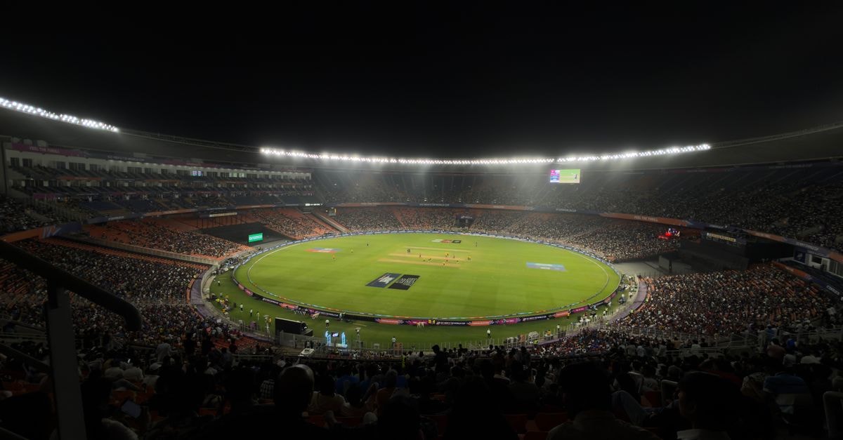 India's Ankur Bhattacharjee claims maiden WTT singles title at WTT Feeder Olomouc A captivating night cricket match with a large crowd at Narendra Modi Stadium in Ahmedabad, India.