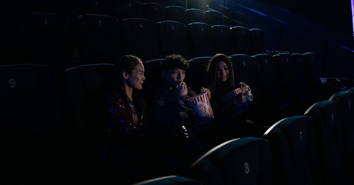 'Toxic' box office Day 10: Yash film earns Rs 1.75 cr as India net nears Rs 242 cr, worldwide crosses Rs 331 cr Group of friends watching a movie at a cinema while enjoying popcorn.