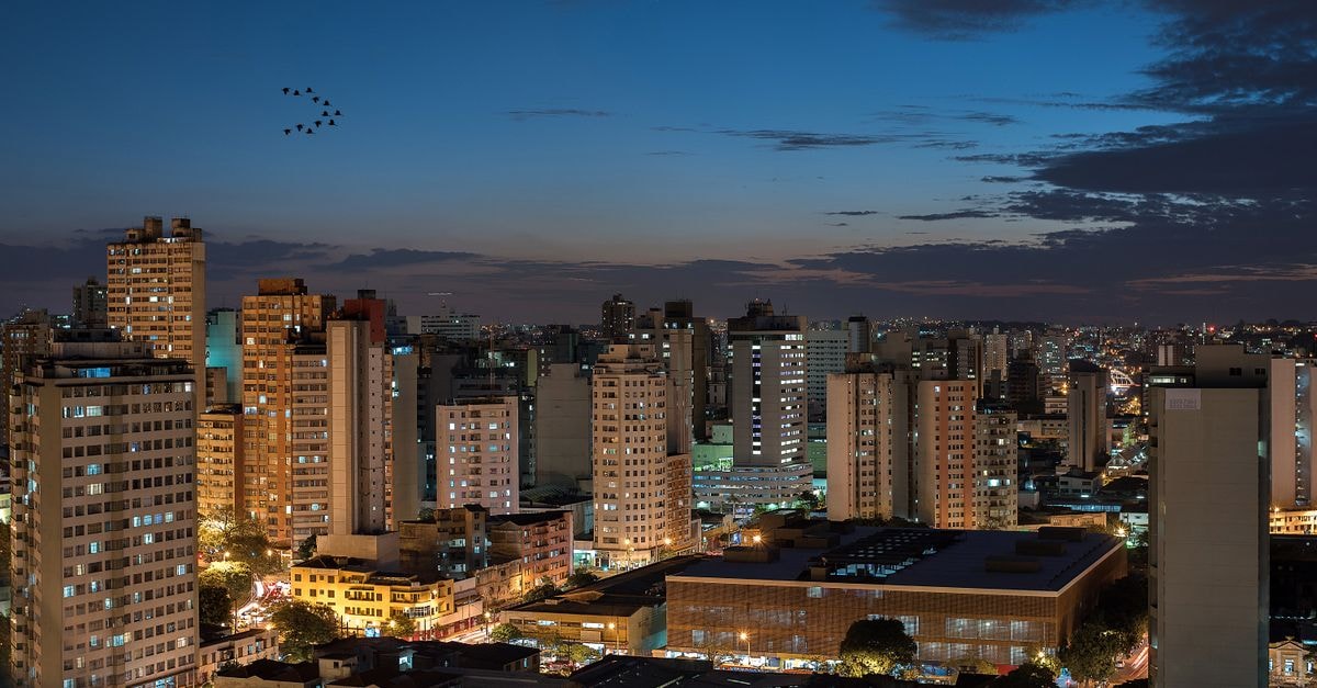 Acacia Hotel in Wote: A Quiet Makueni County Stay With Two Conference Halls Aerial view of illuminated buildings in Belo Horizonte, Brazil, at dusk.