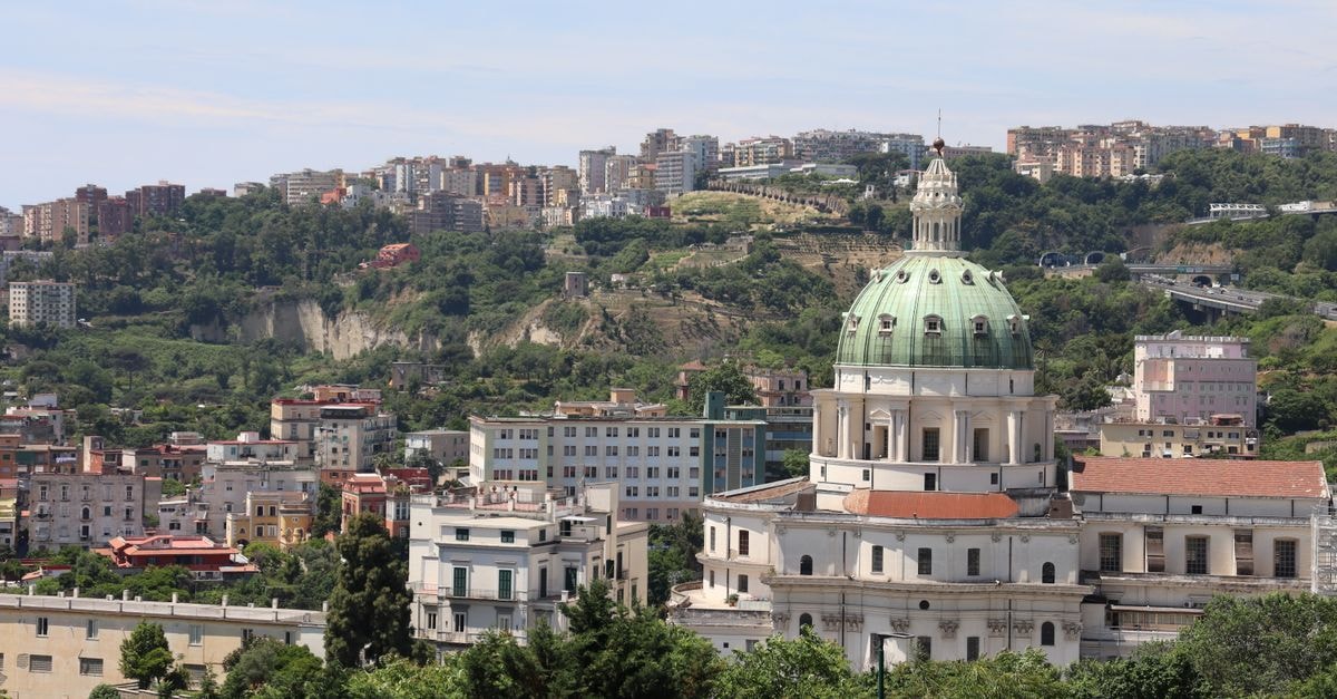 Explore the stunning urban skyline of Naples with the iconic Capodimonte church.