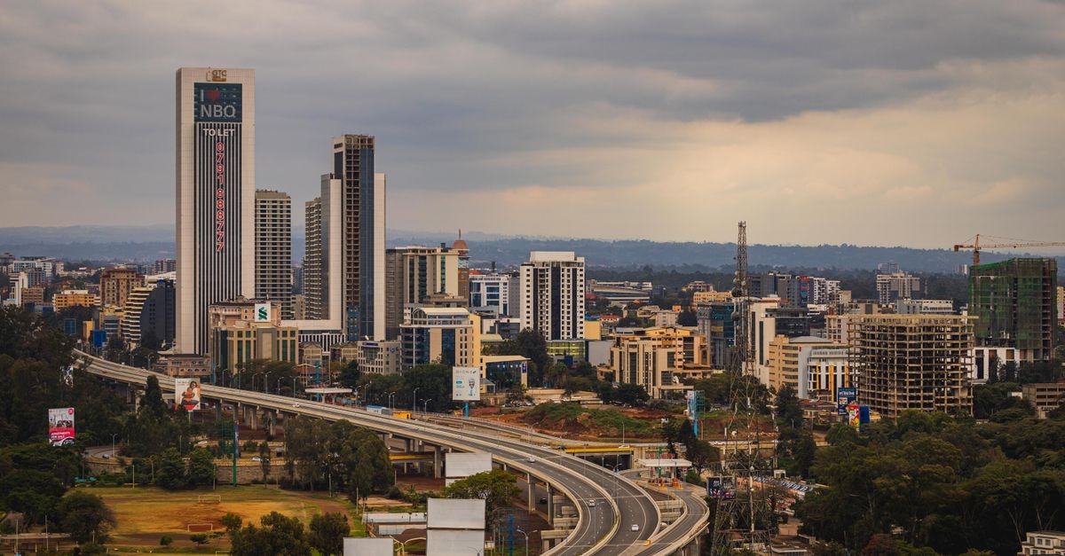 Addis Ababa Travel Guide: Planning Tips, Costs and Things to Do Aerial view of Nairobi's modern skyline and expressway under cloudy skies.